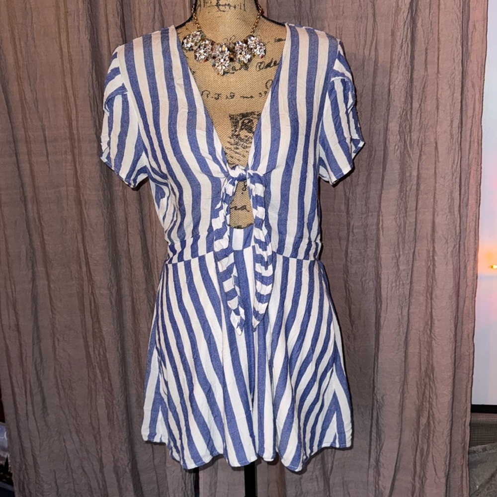 Blue and white striped romper from Charlotte Russe with peep hole tie in front